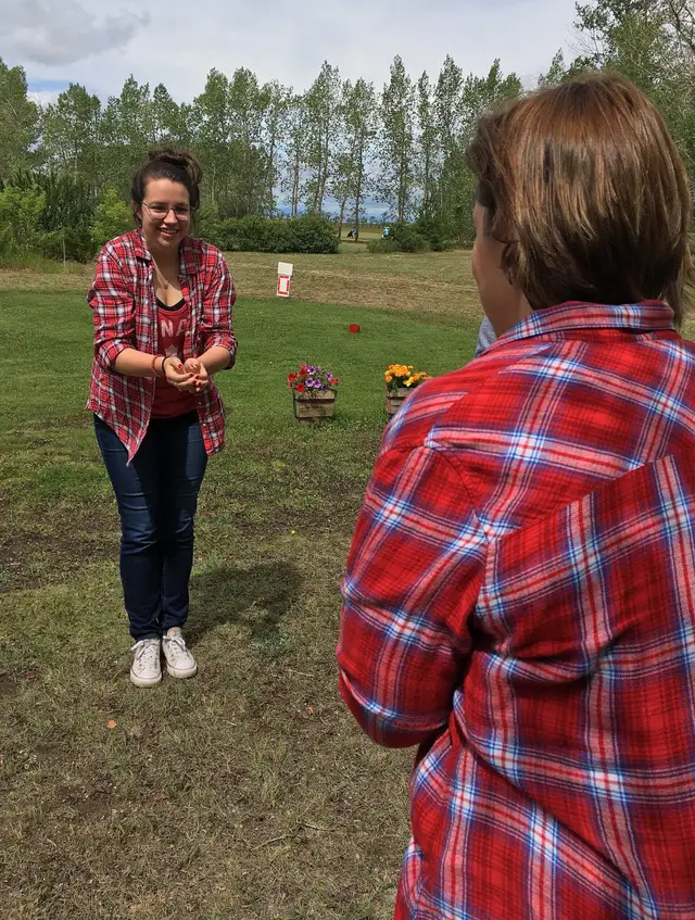 Balloon toss game on the grass